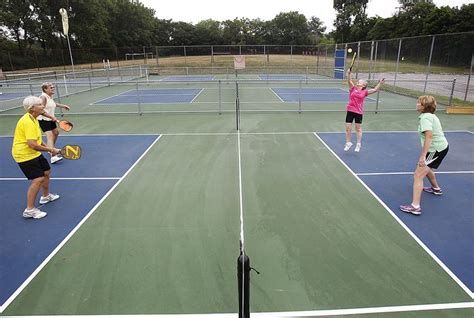 Seniors playing pickleball