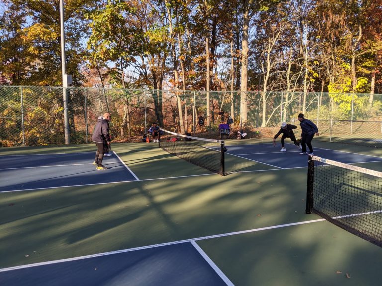 Who serves first in pickleball?